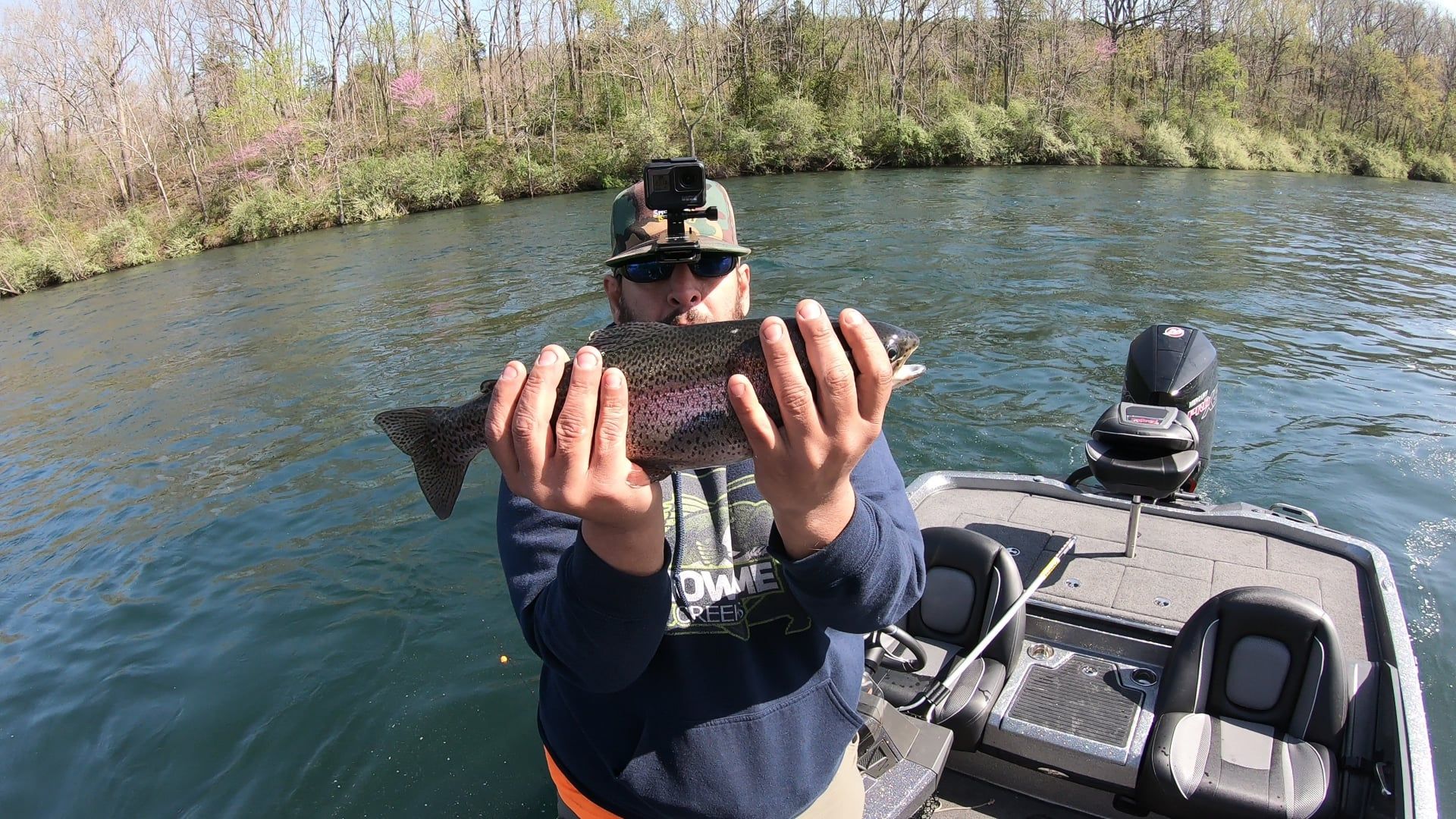 Fisherman fishing at unknown location