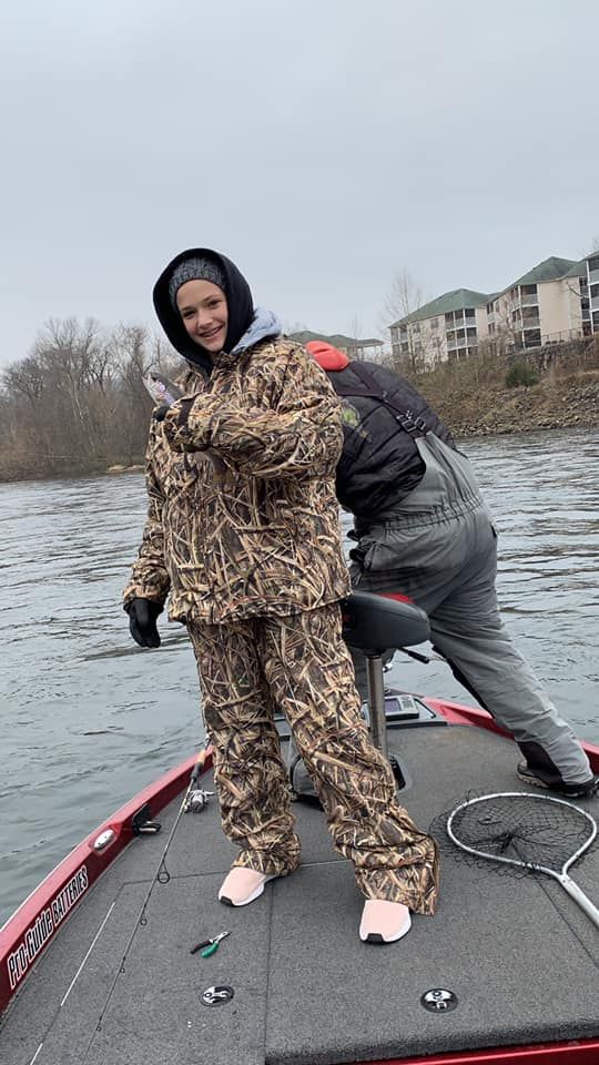 Angler fishing at unknown location