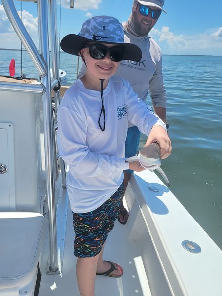 Two people enjoying a great fishing trip