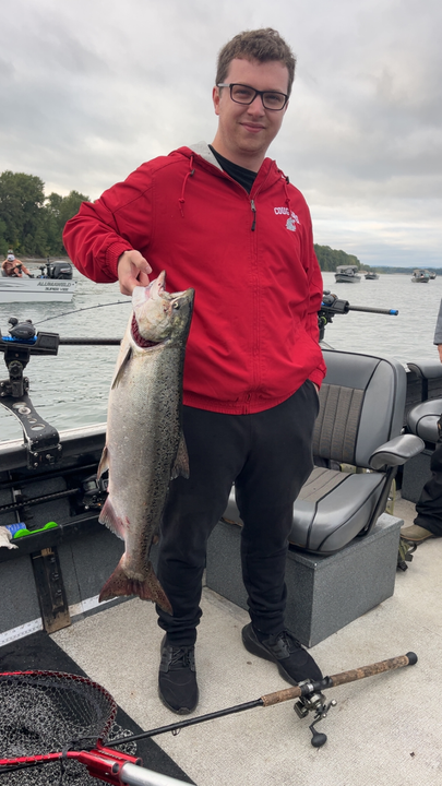 Nice Chinook salmon using jigging and trolling techniques in partly cloudy conditions.