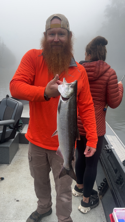 Nice Coho Salmon using jigging and trolling techniques in clearing afternoon conditions.