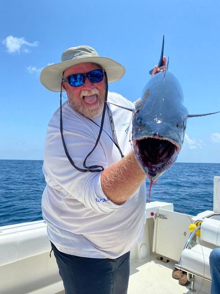 Angler fishing in unknown location