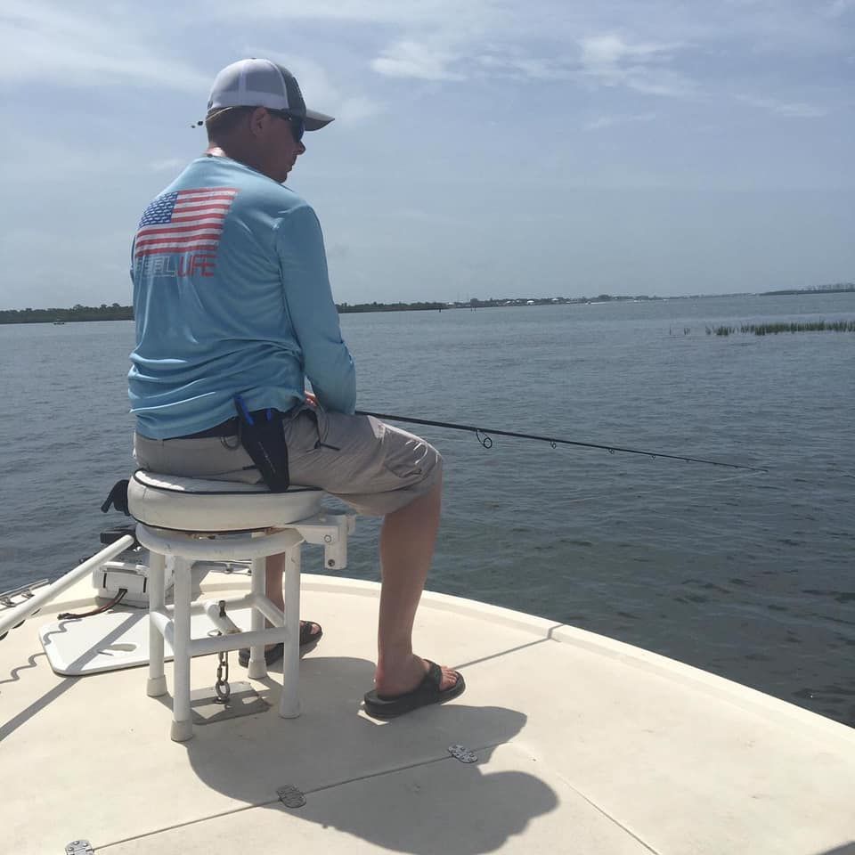 Angler fishing in scenic location