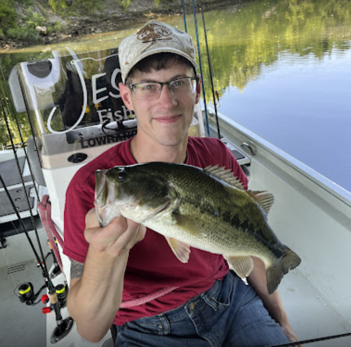 Lone angler fishing at scenic location