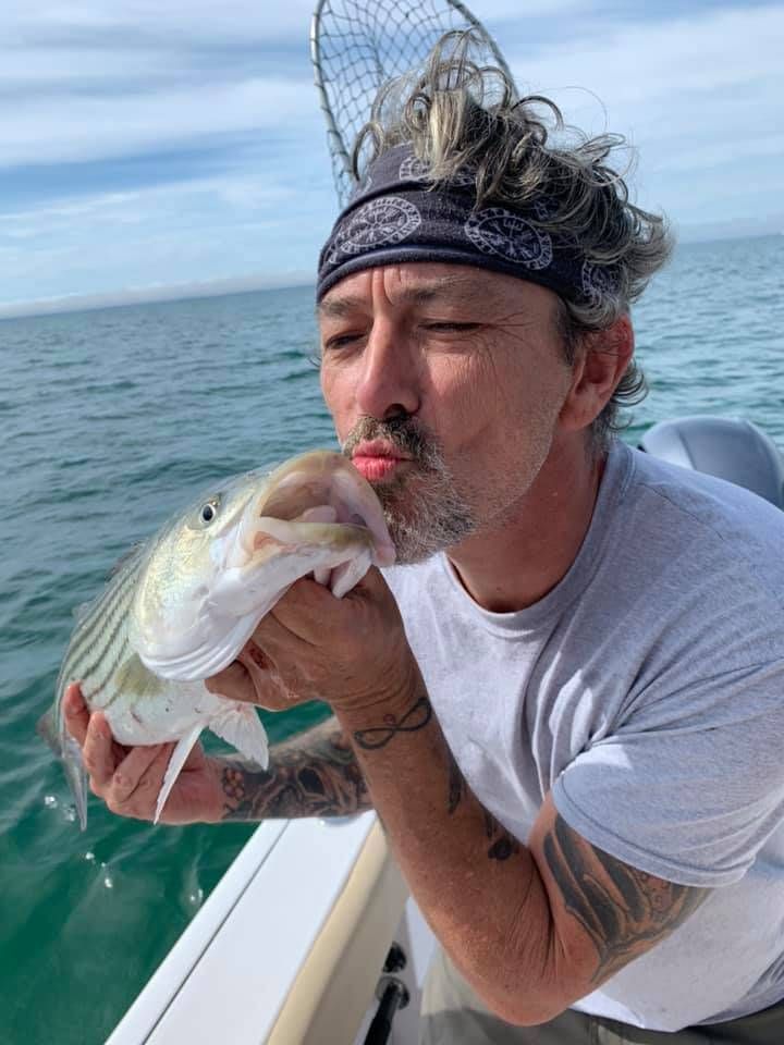 A lone fisherman on the water