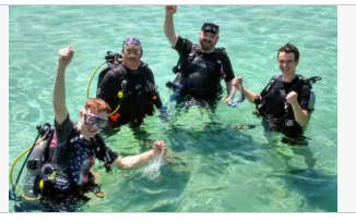Three people fishing in an unknown location