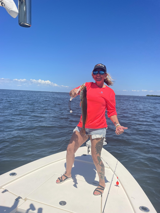 Peaceful day on the lake with a good catch.