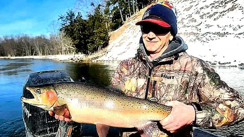 Caught a beautiful rainbow trout while fishing