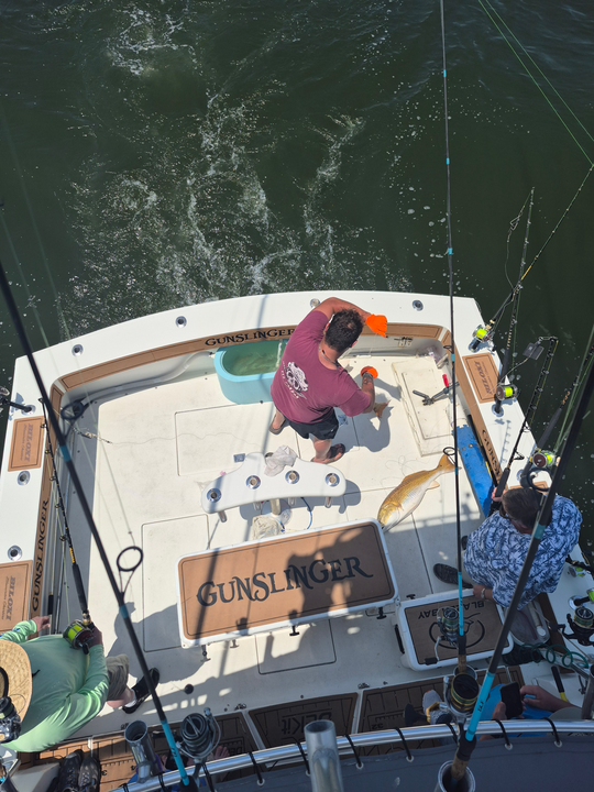 Hauling in another catch on the high seas.