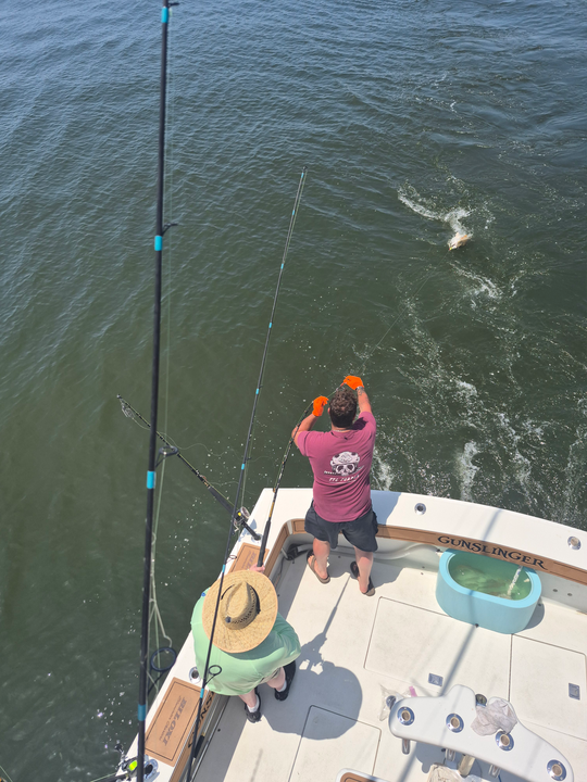 Hooked a big one out on the open sea.