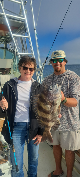 Reeling in a big catch on the open waters.