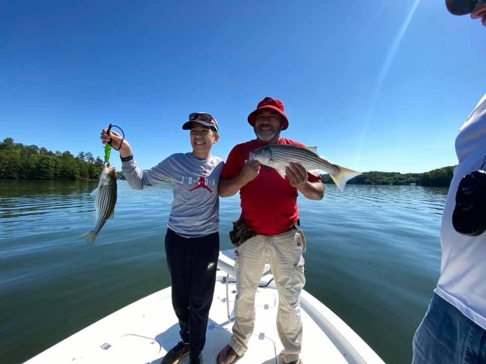 Two anglers fishing in unknown location