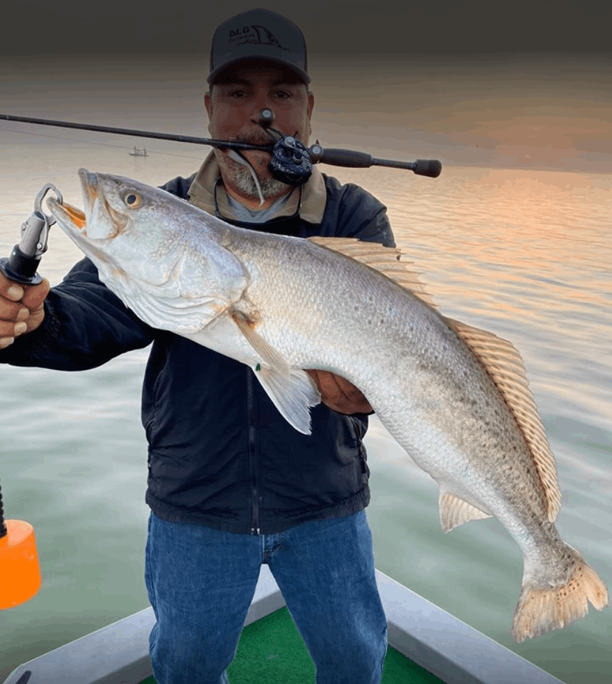 Fisherman with a big catch in an unknown location