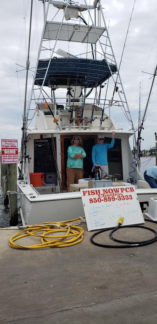 Two anglers fishing in a scenic location