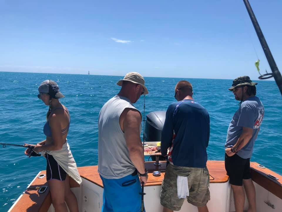 Two people fishing at an undisclosed location