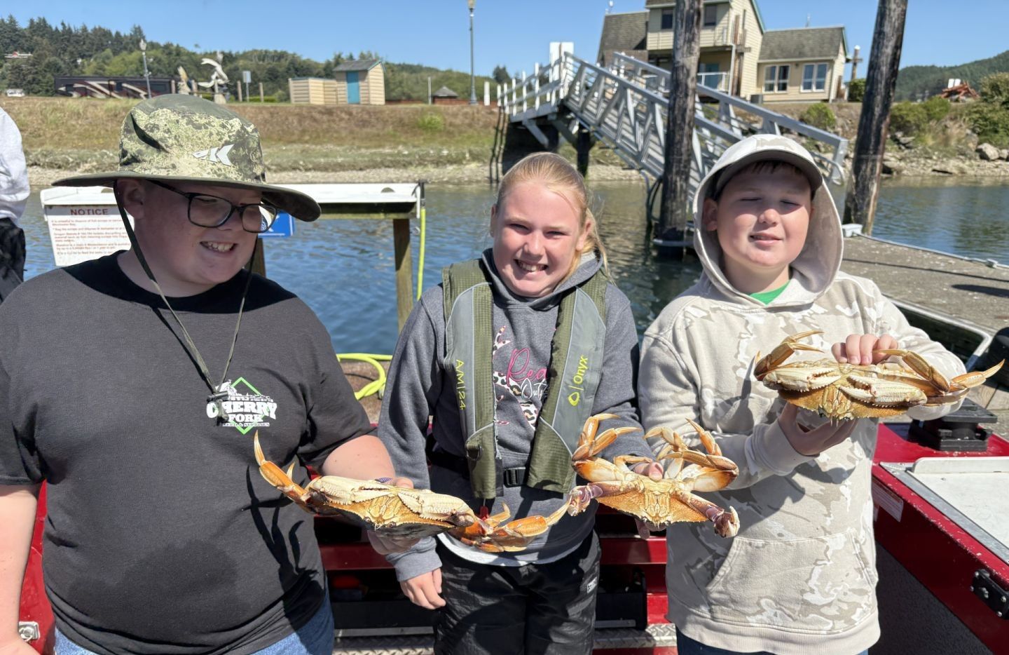 Three people fishing in unknown location