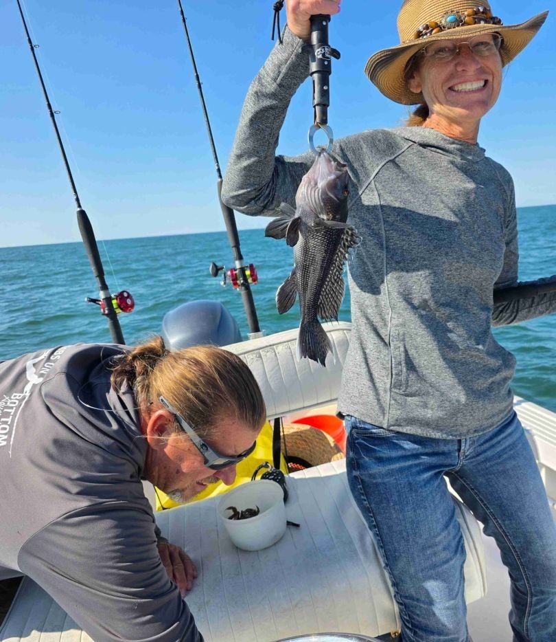 Black sea bass caught while fishing on a boat in open water