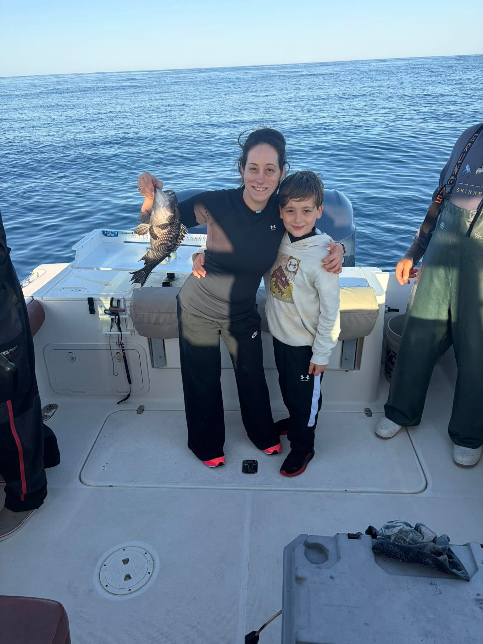 Black sea bass caught during fishing trip on boat in open water