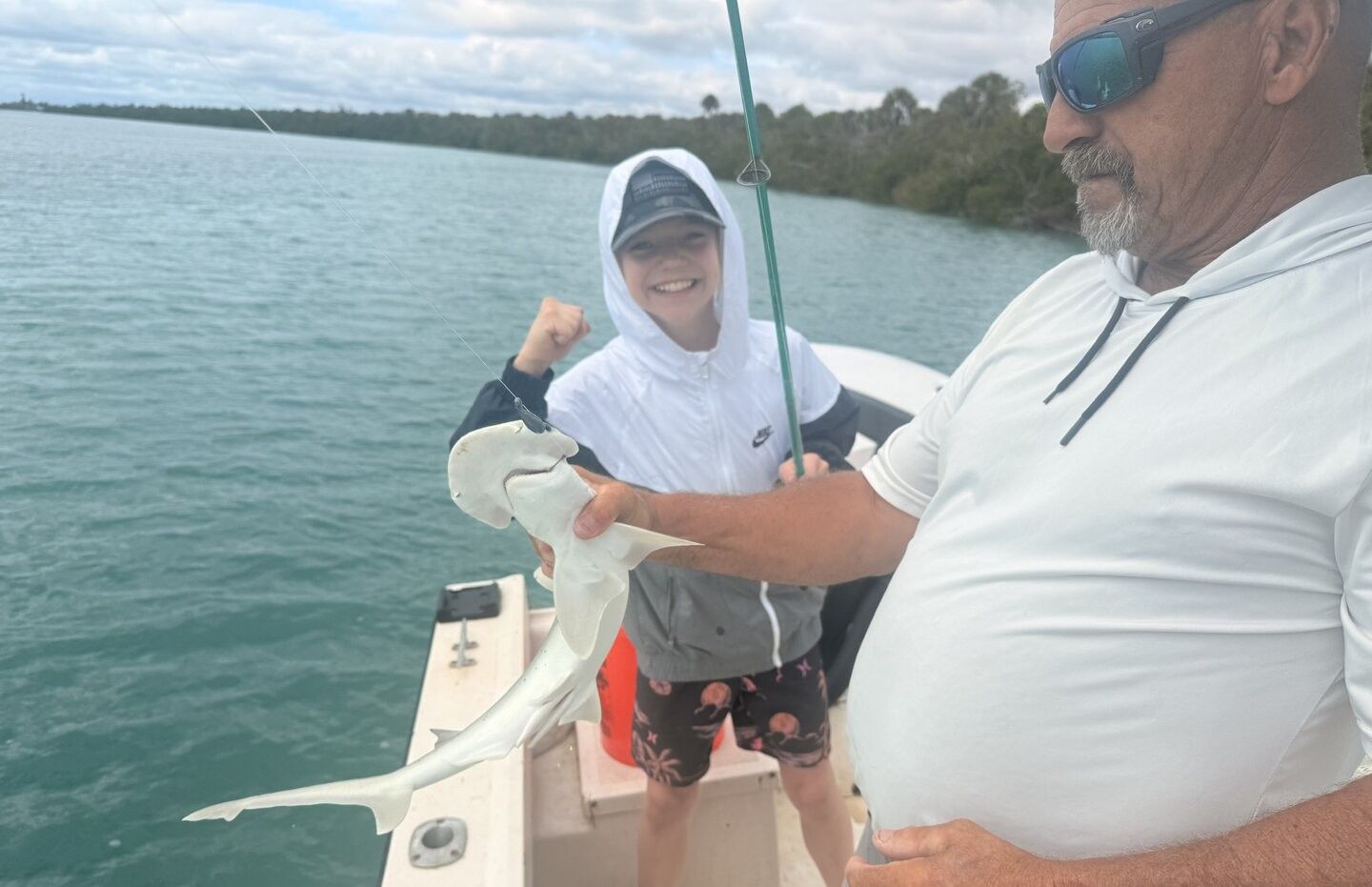 Bonnethead shark being held on fishing boat