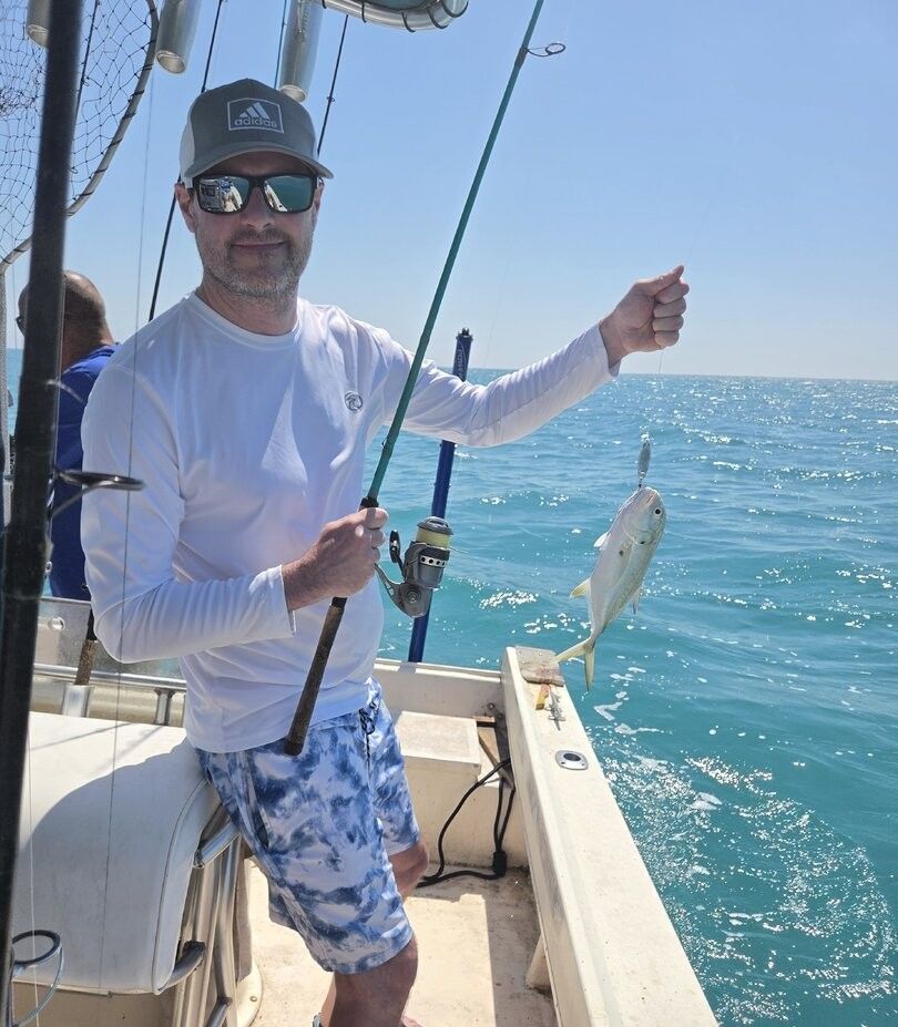 Crevalle jack caught while fishing from boat on ocean waters