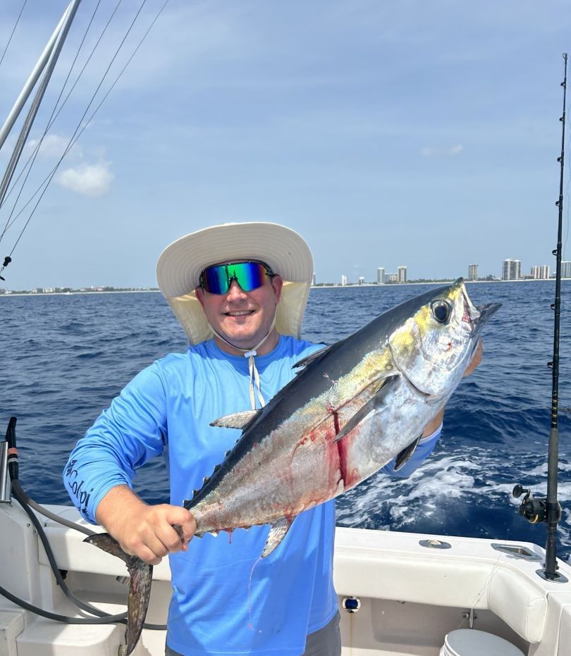 Lone angler fishing in unknown location