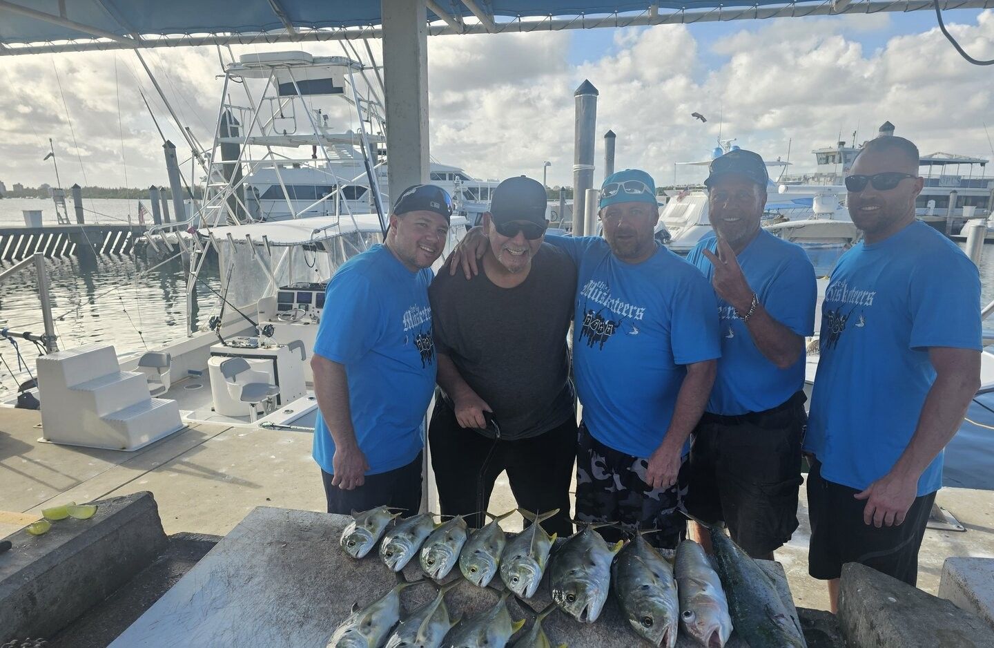 Five anglers enjoying a day of fishing