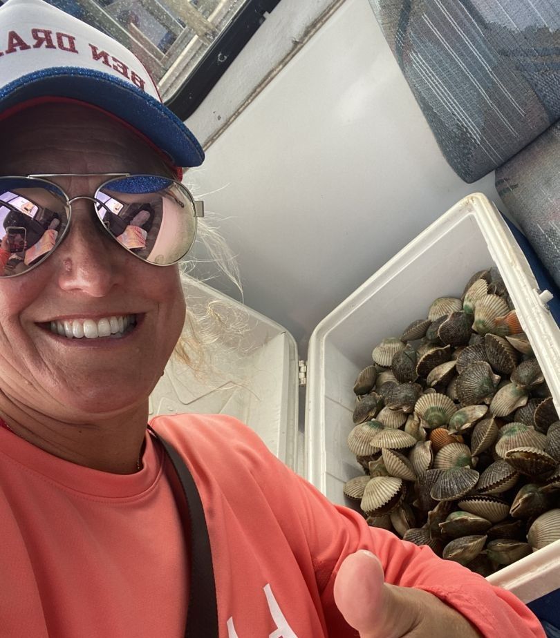 Fresh shellfish harvest displayed in white cooler
