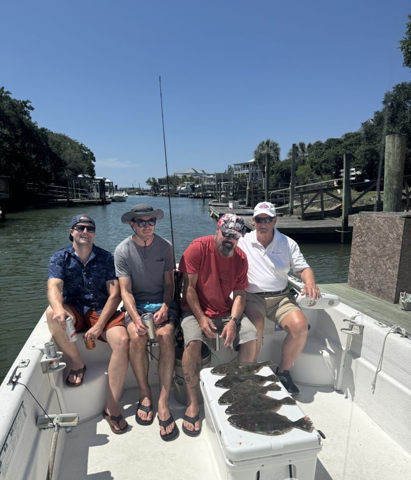 Three people enjoying fishing at unknown location