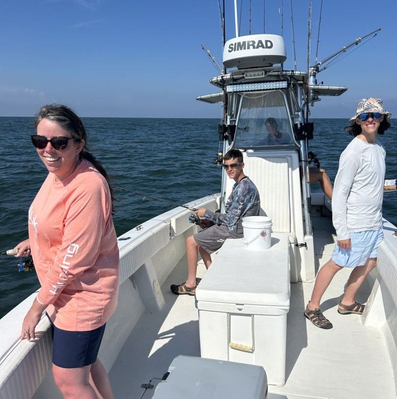 Fishing boat on open water with fishing equipment and radar technology