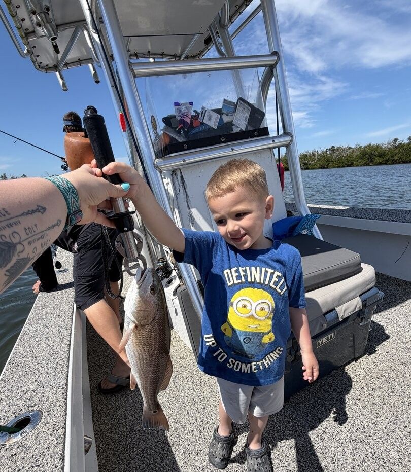 Freshly caught redfish being displayed on fishing boat deck
