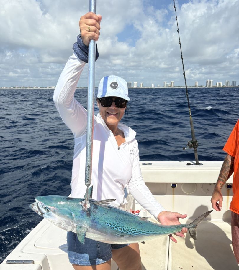 Angler fishing in scenic location