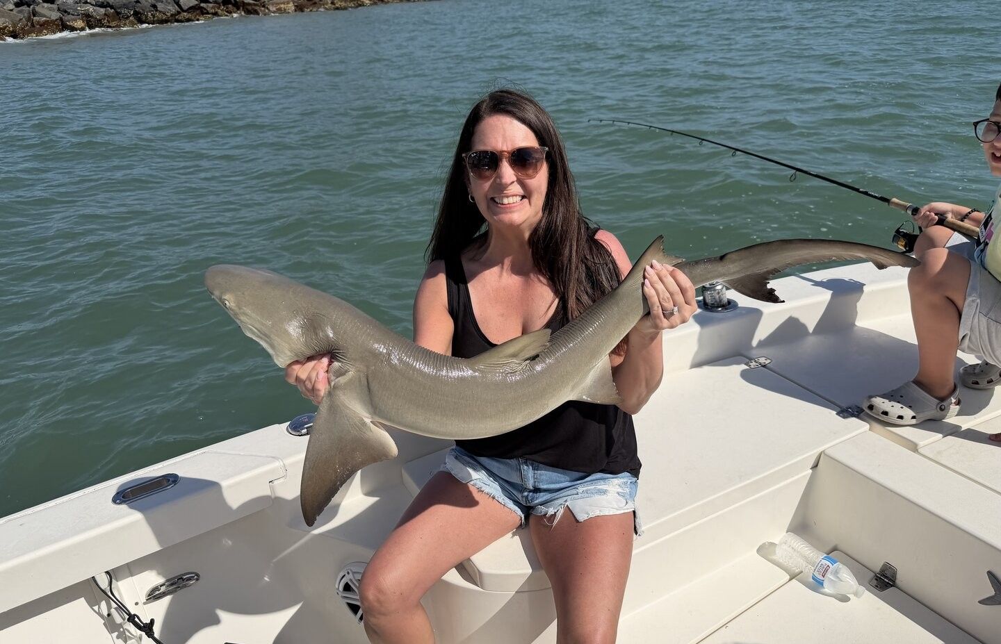 Shark caught while fishing from boat on water