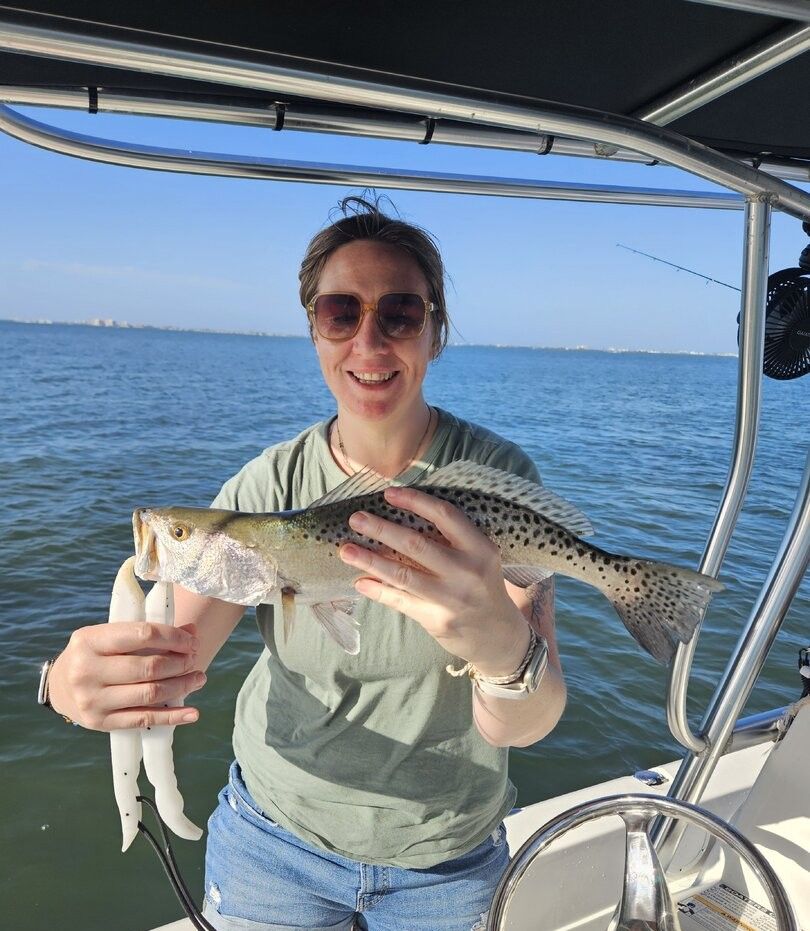 Speckled trout caught while fishing on boat in open water