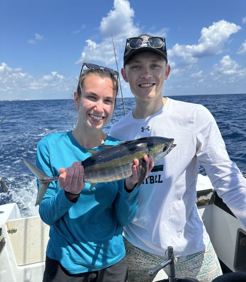 Yellowfin tuna catch displayed on fishing boat in open ocean waters