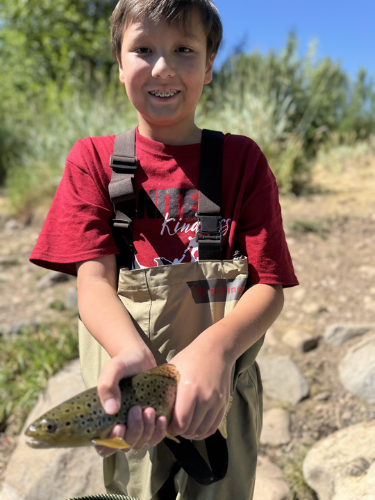 Pristine Sea Trout lured by expert fly fishing in Provo's crystal-clear waters!