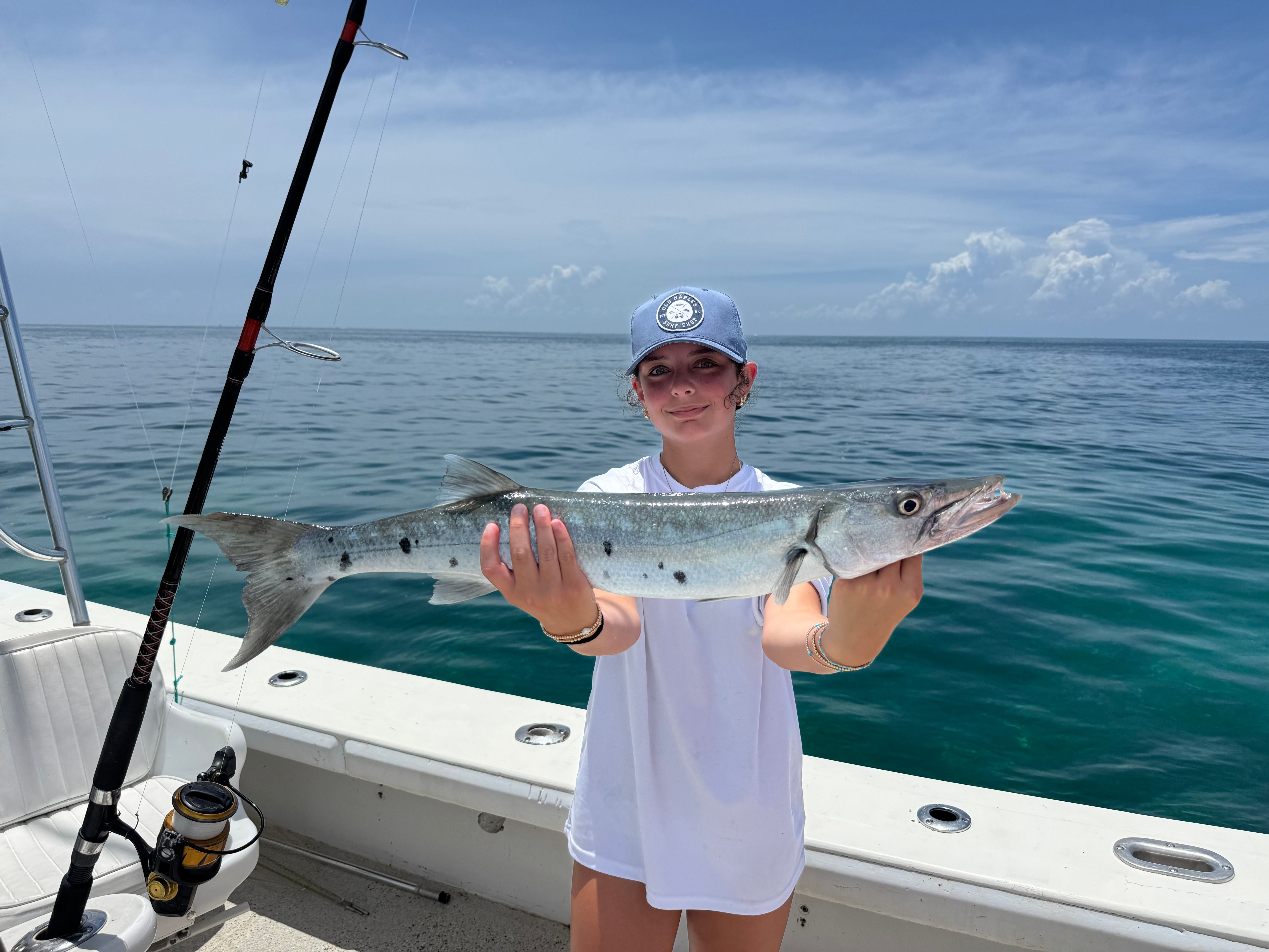 A great barracuda, a large fish caught during a fishing trip.