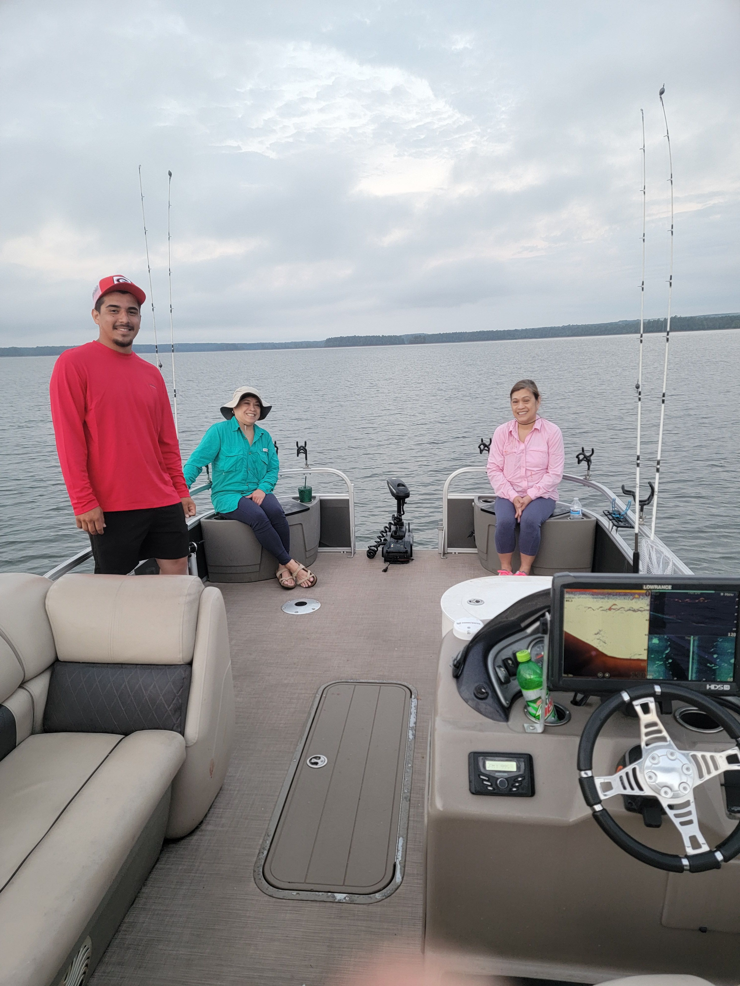 Three anglers enjoying the great outdoors while fishing