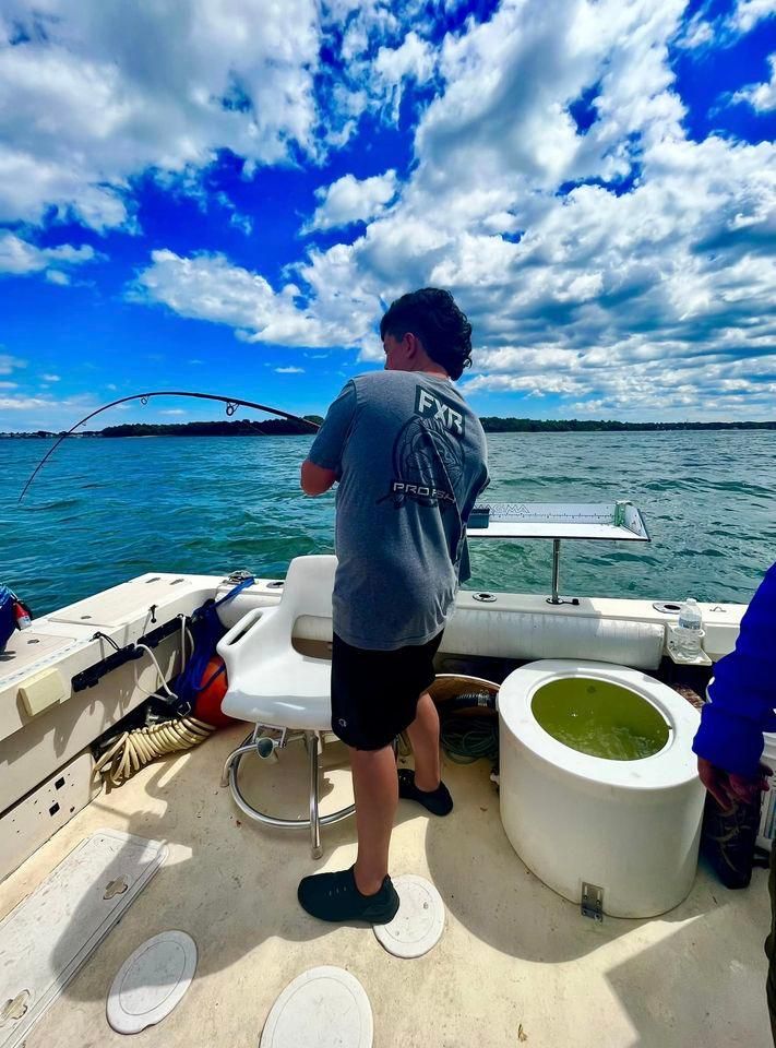 Fisherman casting line in unknown location