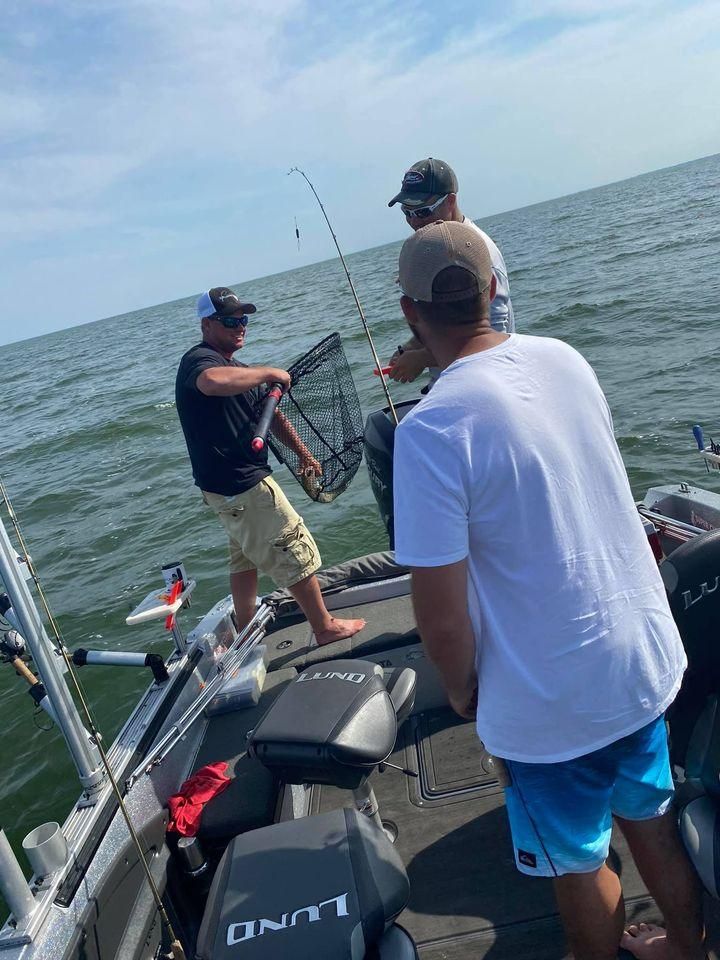 Two people fishing at an undisclosed location