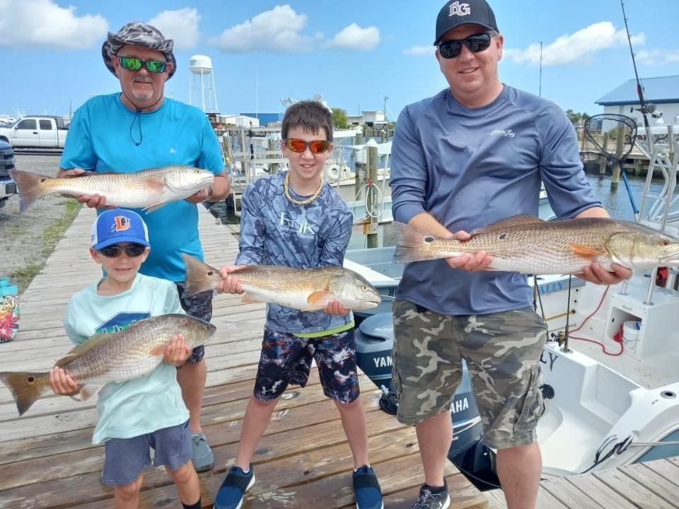 Redfish catch with 4 fishermen