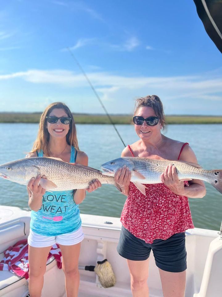 Two big redfish caught during fishing trip