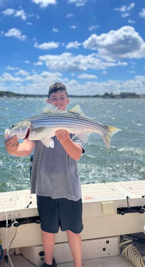 Striped bass fishing in unknown location