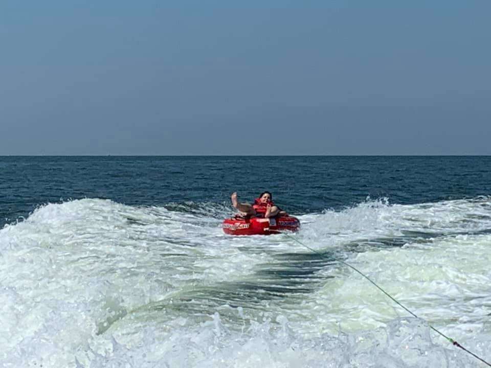 A person fishing in an unknown location