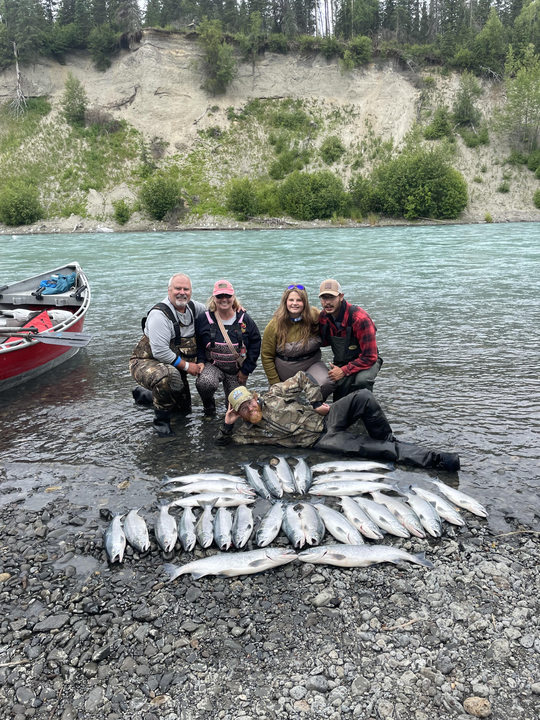 Jigging under partly cloudy skies in Cohoe - the best way to fish!