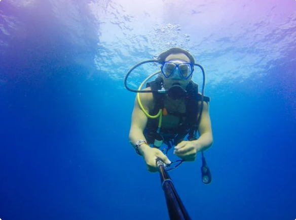 A person fishing in an unknown location