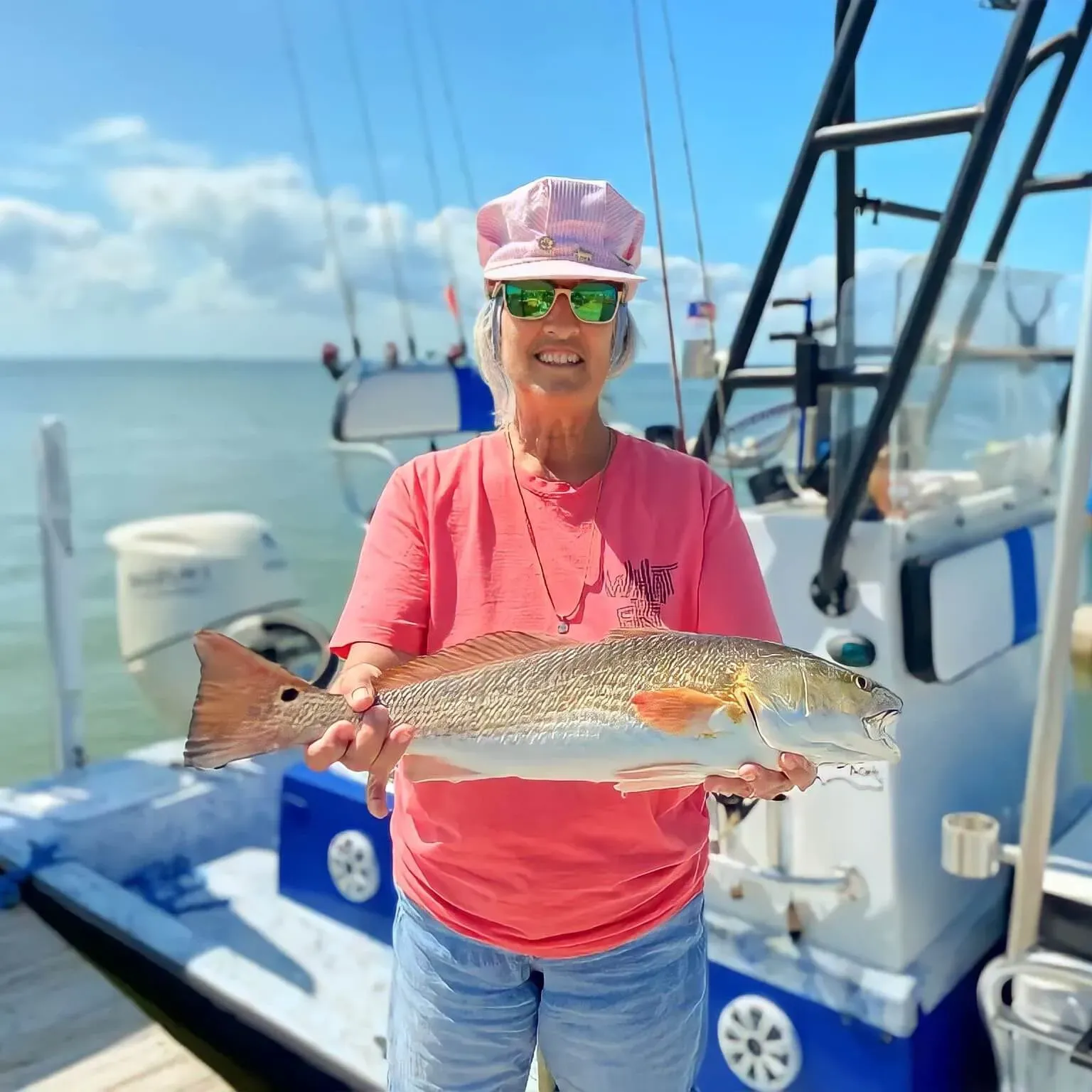 A person fishing in an unknown location