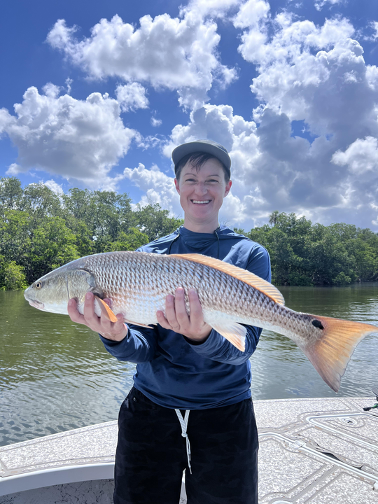 Huge 32-inch redfish caught during a partly cloudy day!