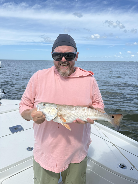 Nice redfish using deep sea and light tackle techniques in partly cloudy conditions!