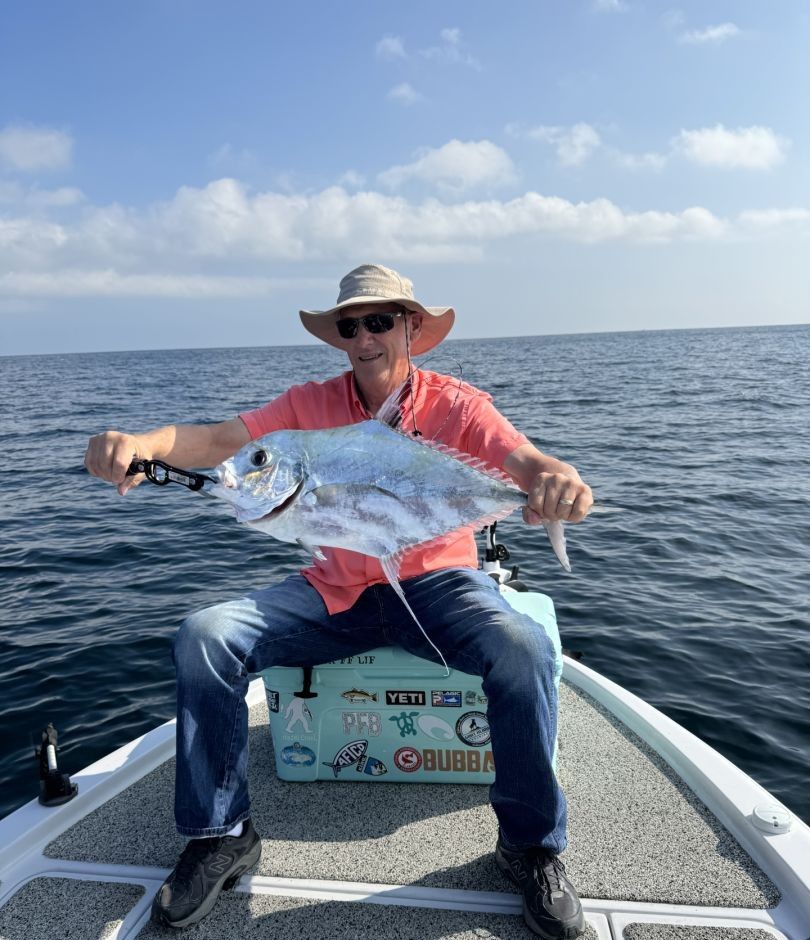 Photograph of an African Pompano, a 20-inch fish caught while fishing
