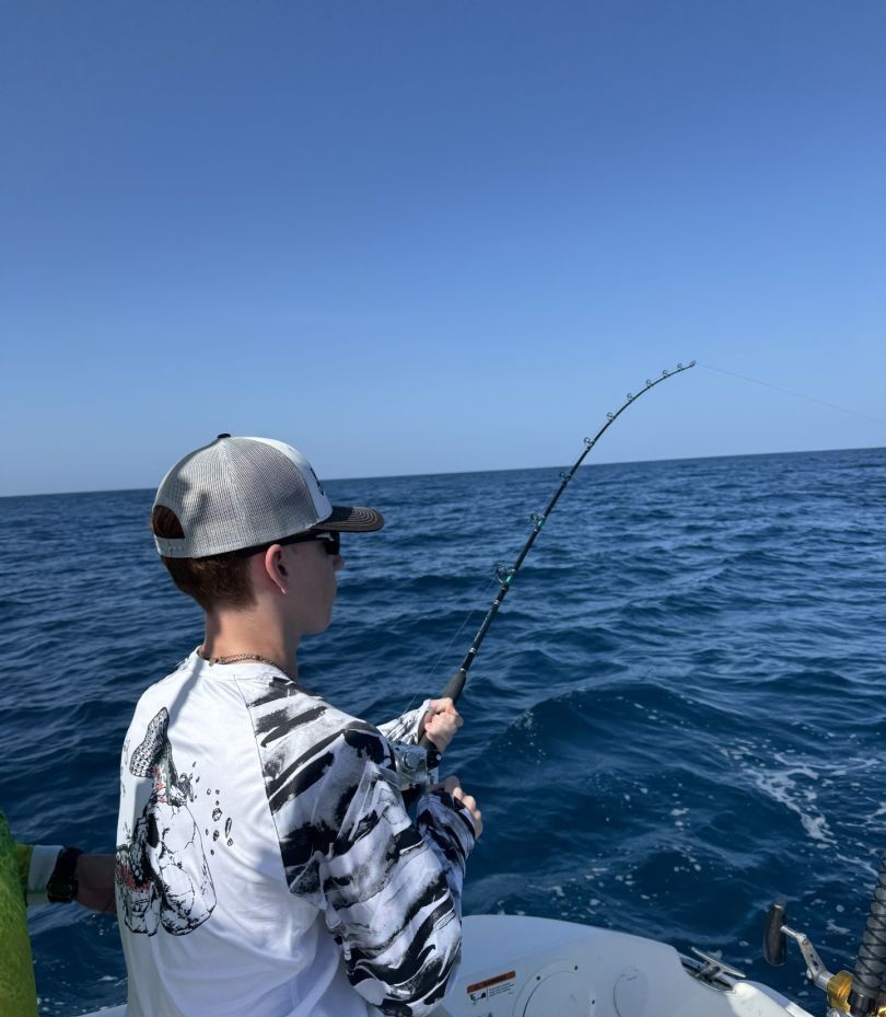 Angler fishing on scenic location